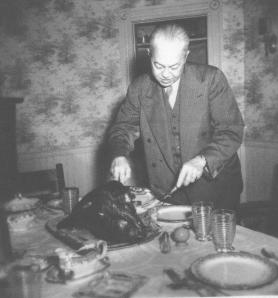 Alfred Duryee Guion (Grandpa) carving the turkey